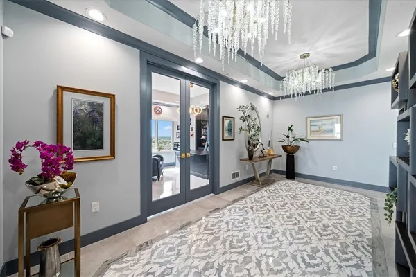 a view of a hallway with a livingroom
