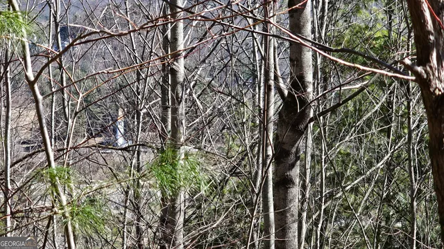 a view of entryway with wooden fence
