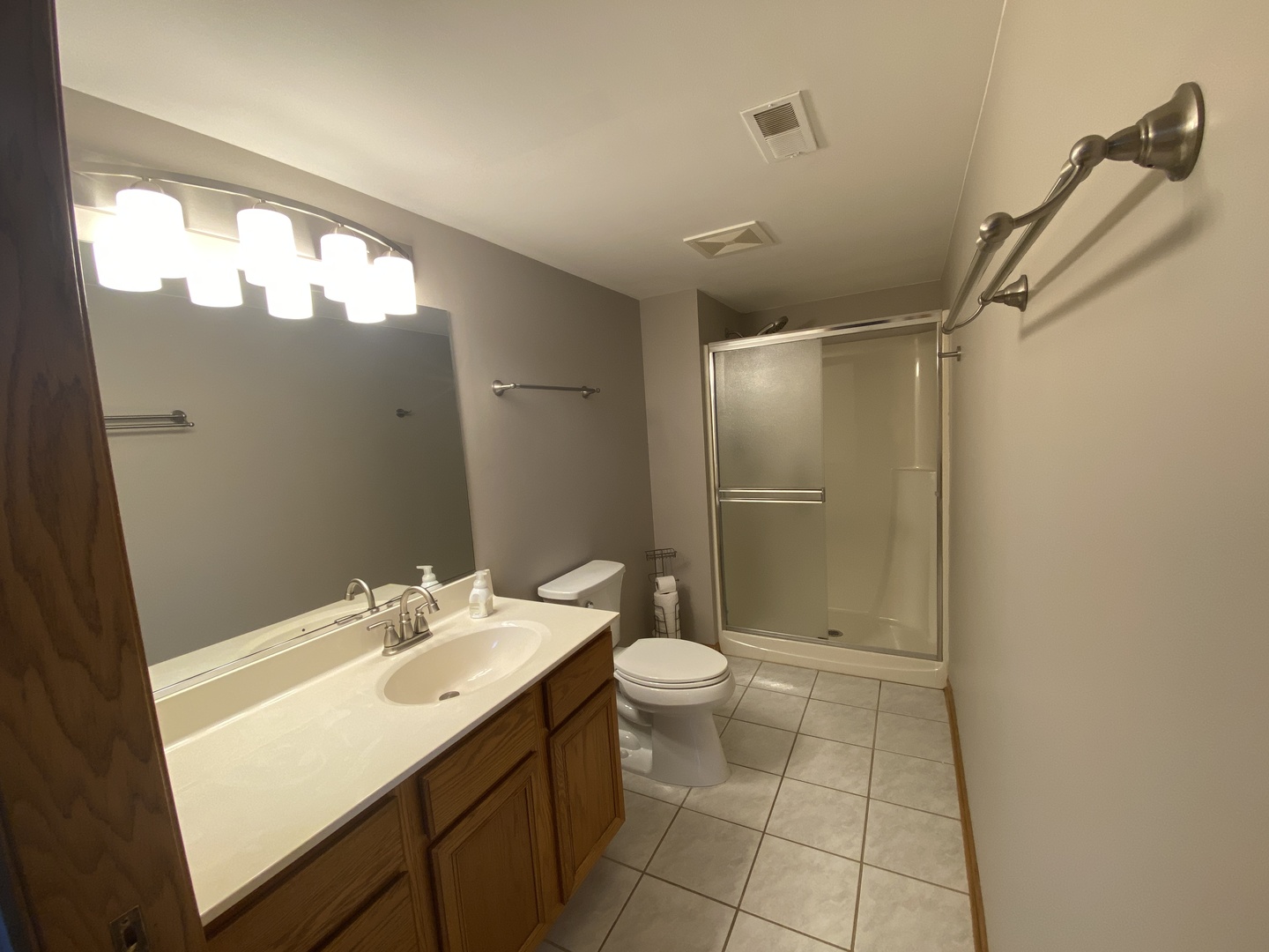 6820 Ridge Point Drive, Unit 21A Oak Forest, IL 60452 - Photo 11 of 16 a bathroom with a sink toilet and shower
