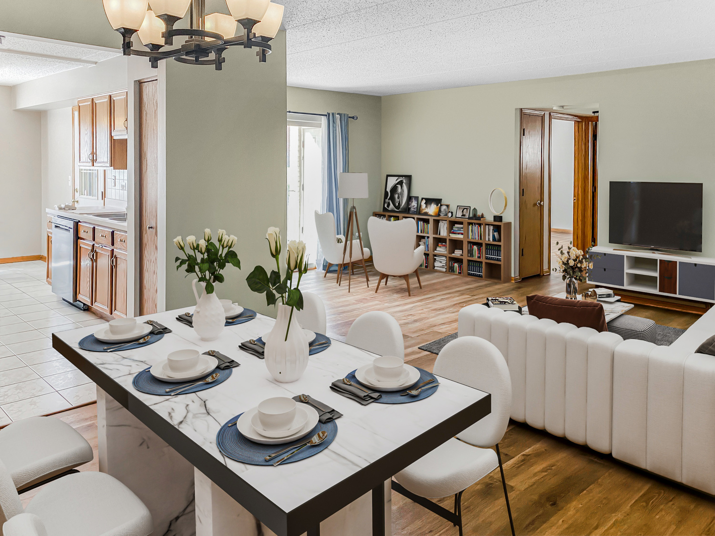 6820 Ridge Point Drive, Unit 21A Oak Forest, IL 60452 - Photo 2 of 16 a living room with furniture a large window and a chandelier