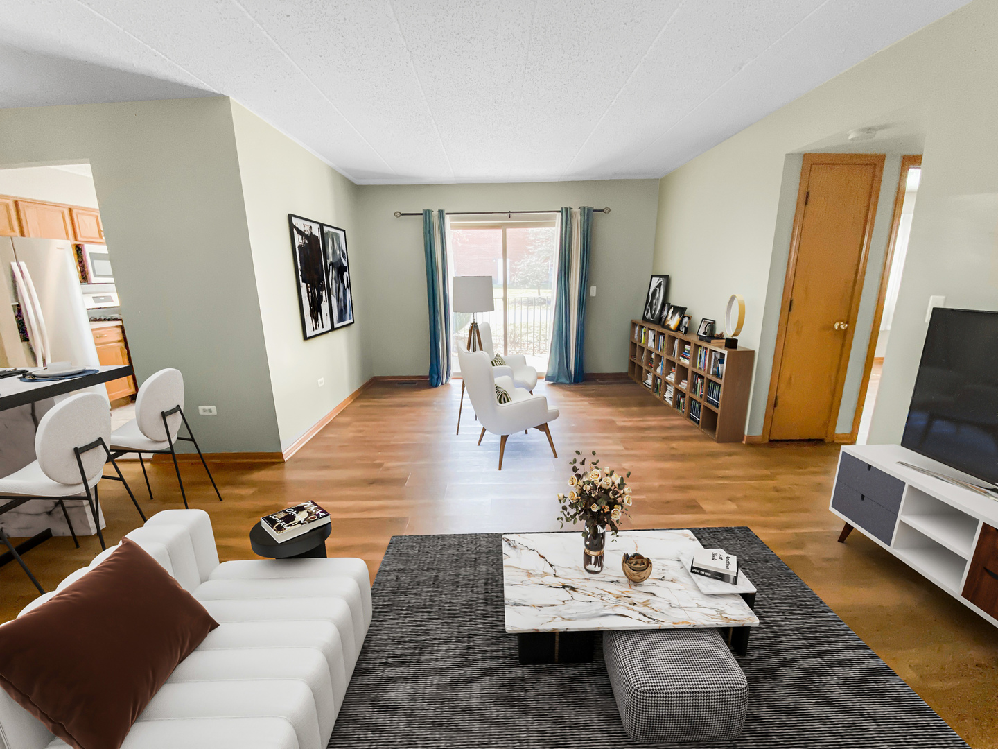 6820 Ridge Point Drive, Unit 21A Oak Forest, IL 60452 - Photo 6 of 16 a living room with furniture and wooden floor