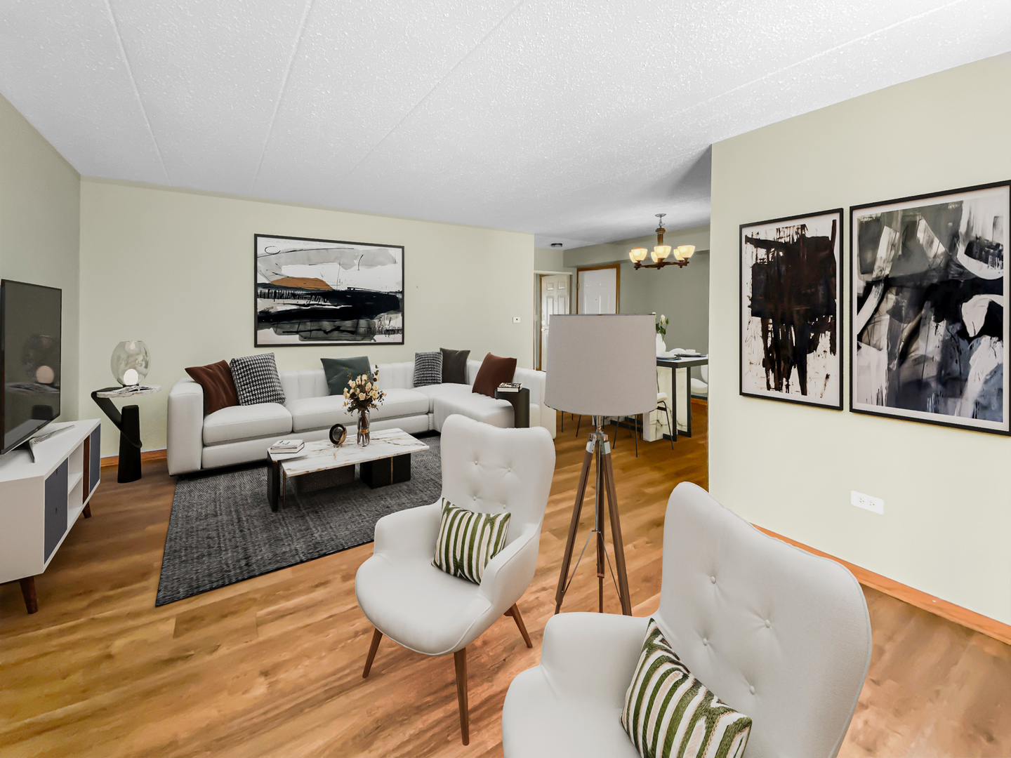 6820 Ridge Point Drive, Unit 21A Oak Forest, IL 60452 - Photo 8 of 16 a living room with furniture and a flat screen tv