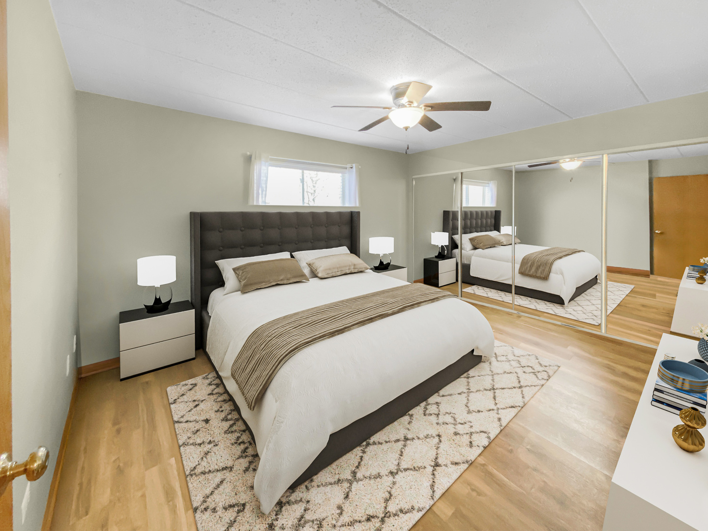 6820 Ridge Point Drive, Unit 21A Oak Forest, IL 60452 - Photo 10 of 16 a bedroom with a large bed and a view of living room