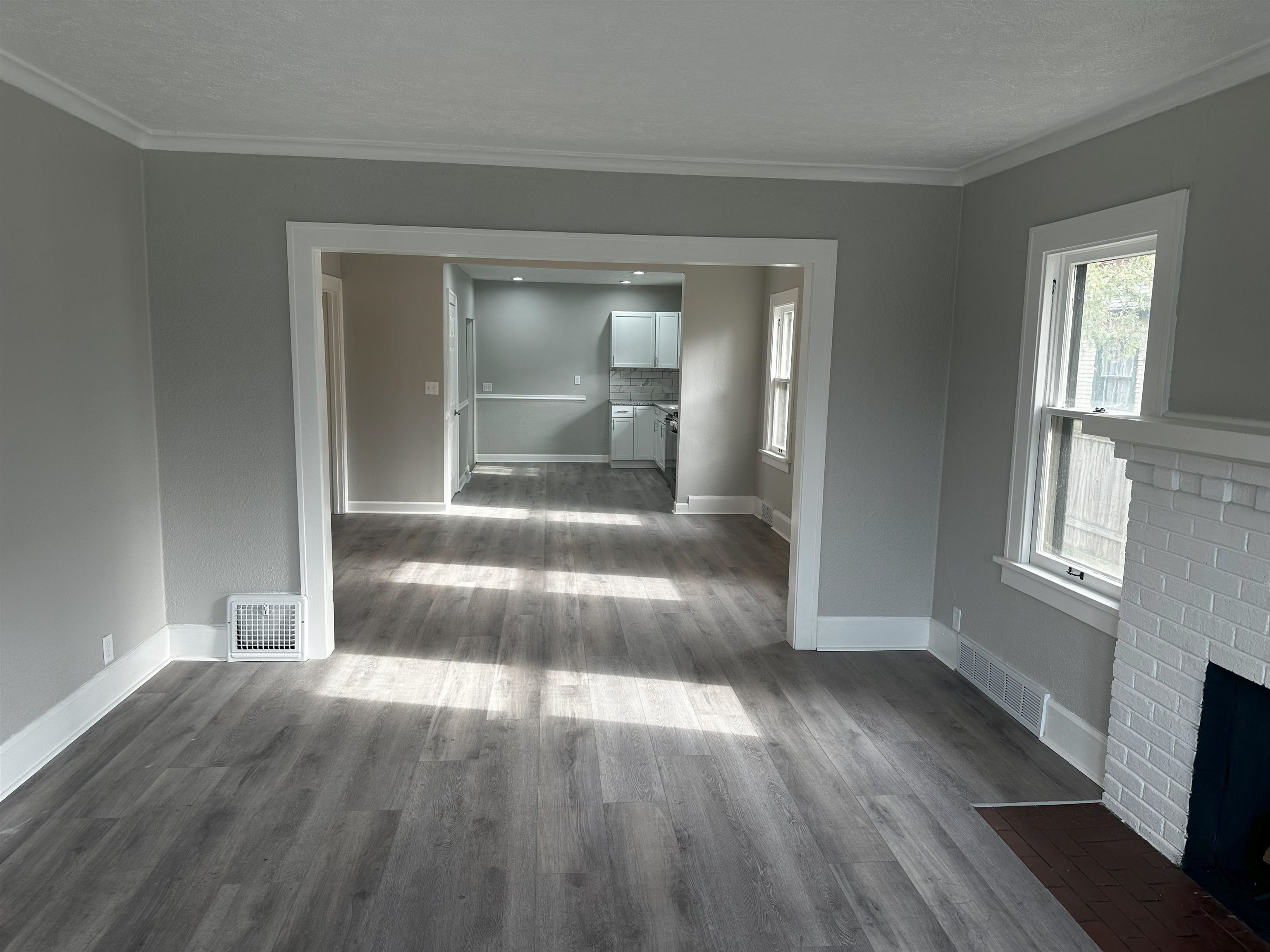 2316 Rural Street Rockford, IL 61107 - Photo 4 of 10 wooden floor in an empty room with a window