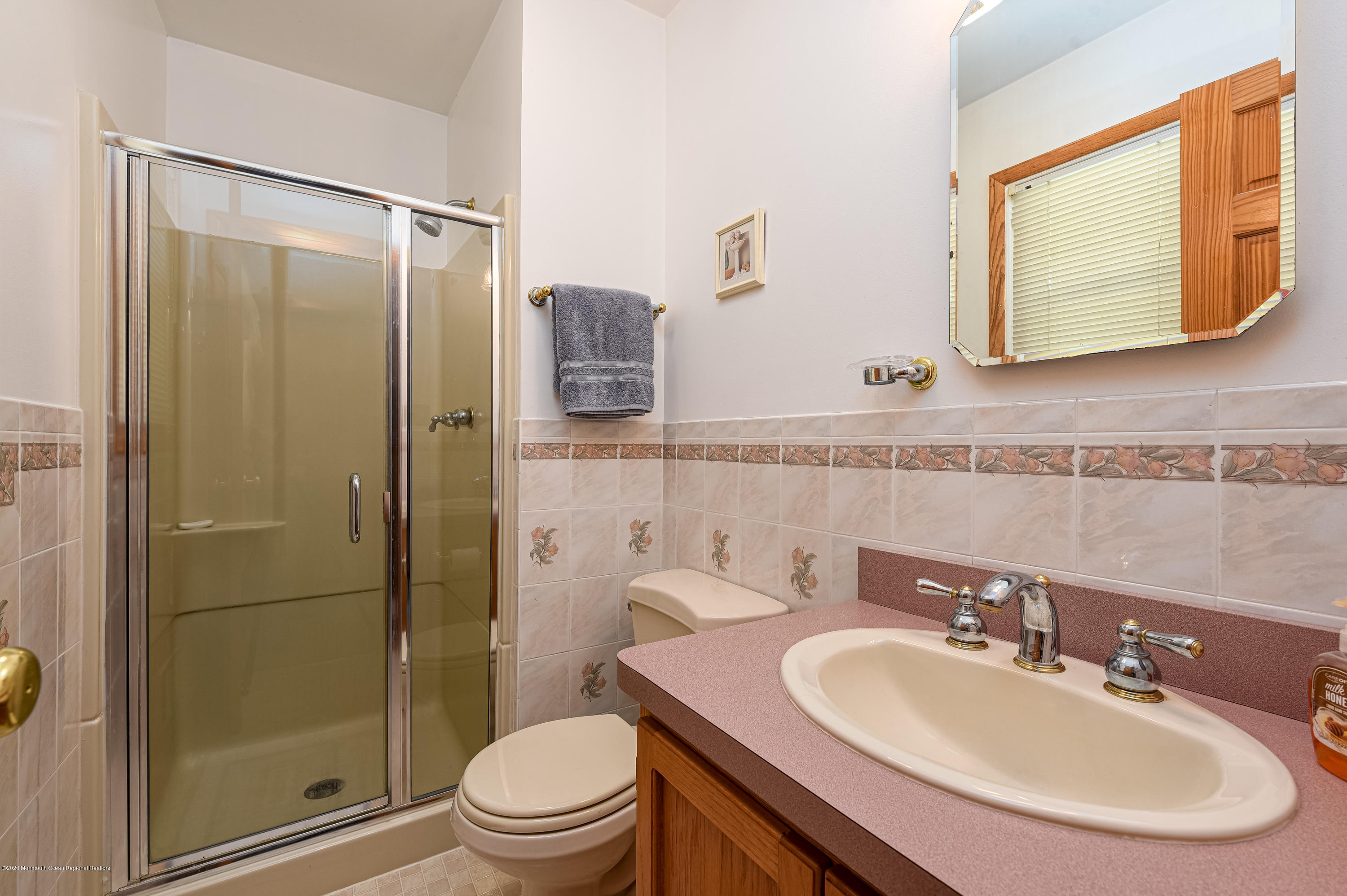 32 South Westfield Road Howell, NJ 07731 - Photo 15 of 28 a bathroom with a sink toilet and shower