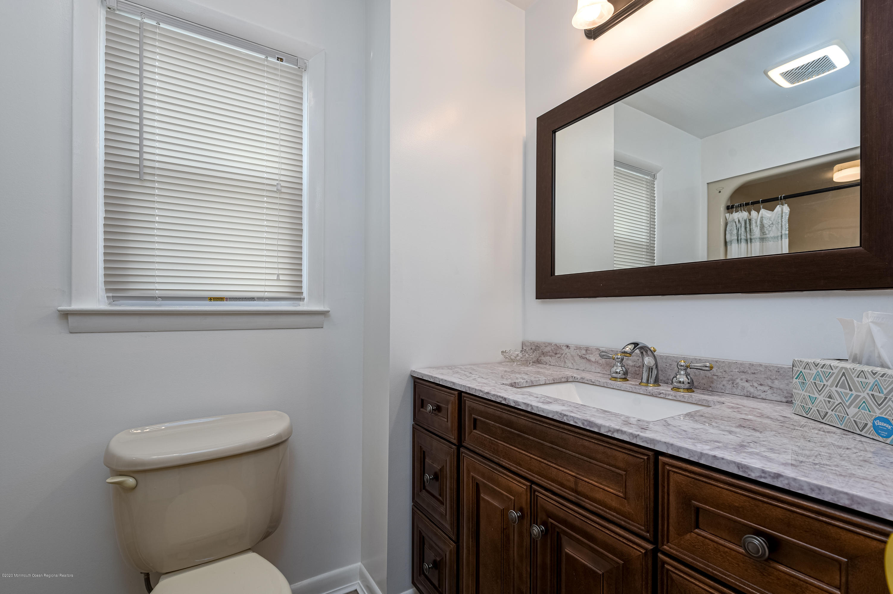 32 South Westfield Road Howell, NJ 07731 - Photo 16 of 28 a bathroom with a granite countertop toilet sink and mirror