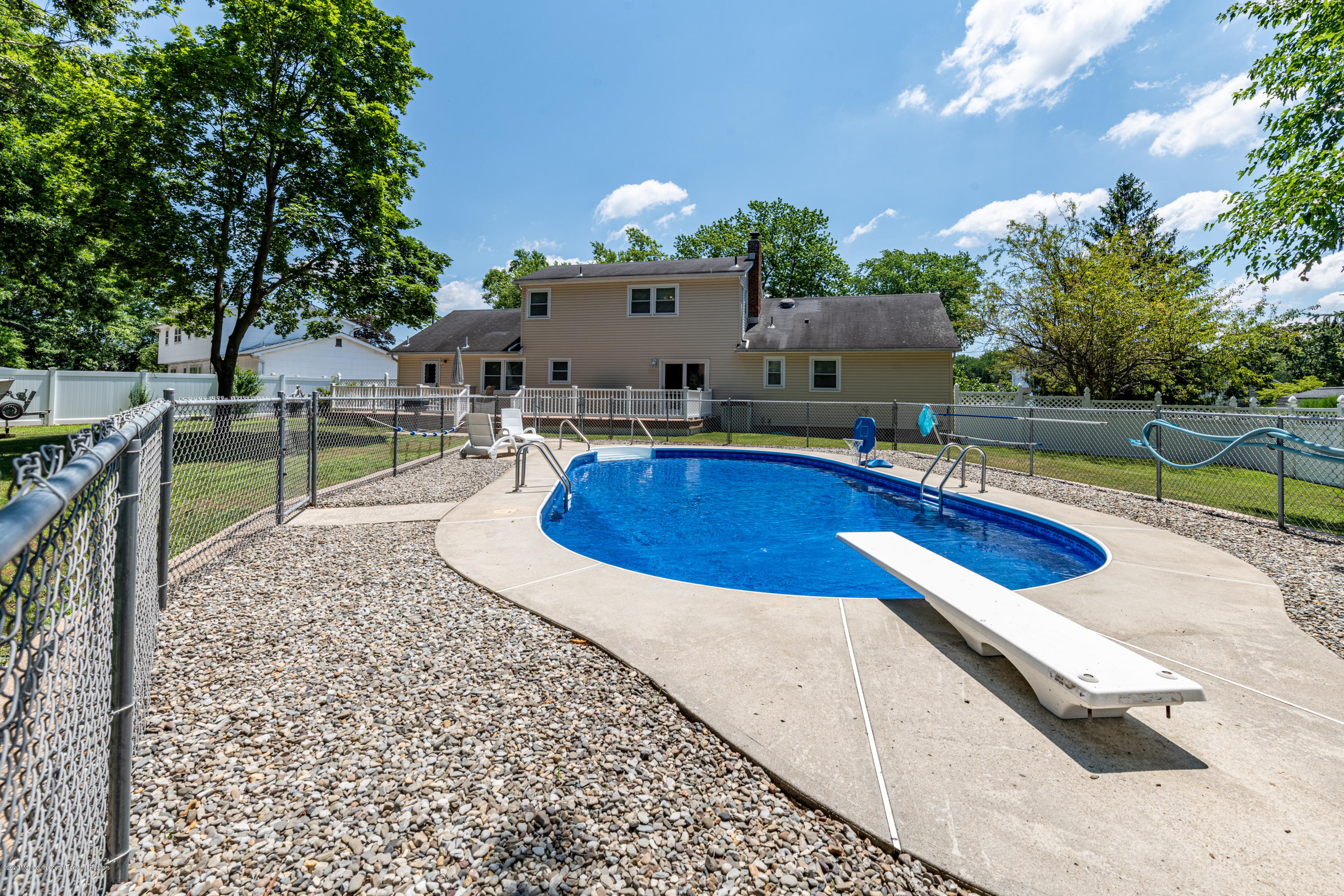 32 South Westfield Road Howell, NJ 07731 - Photo 26 of 28 a view of a house with swimming pool