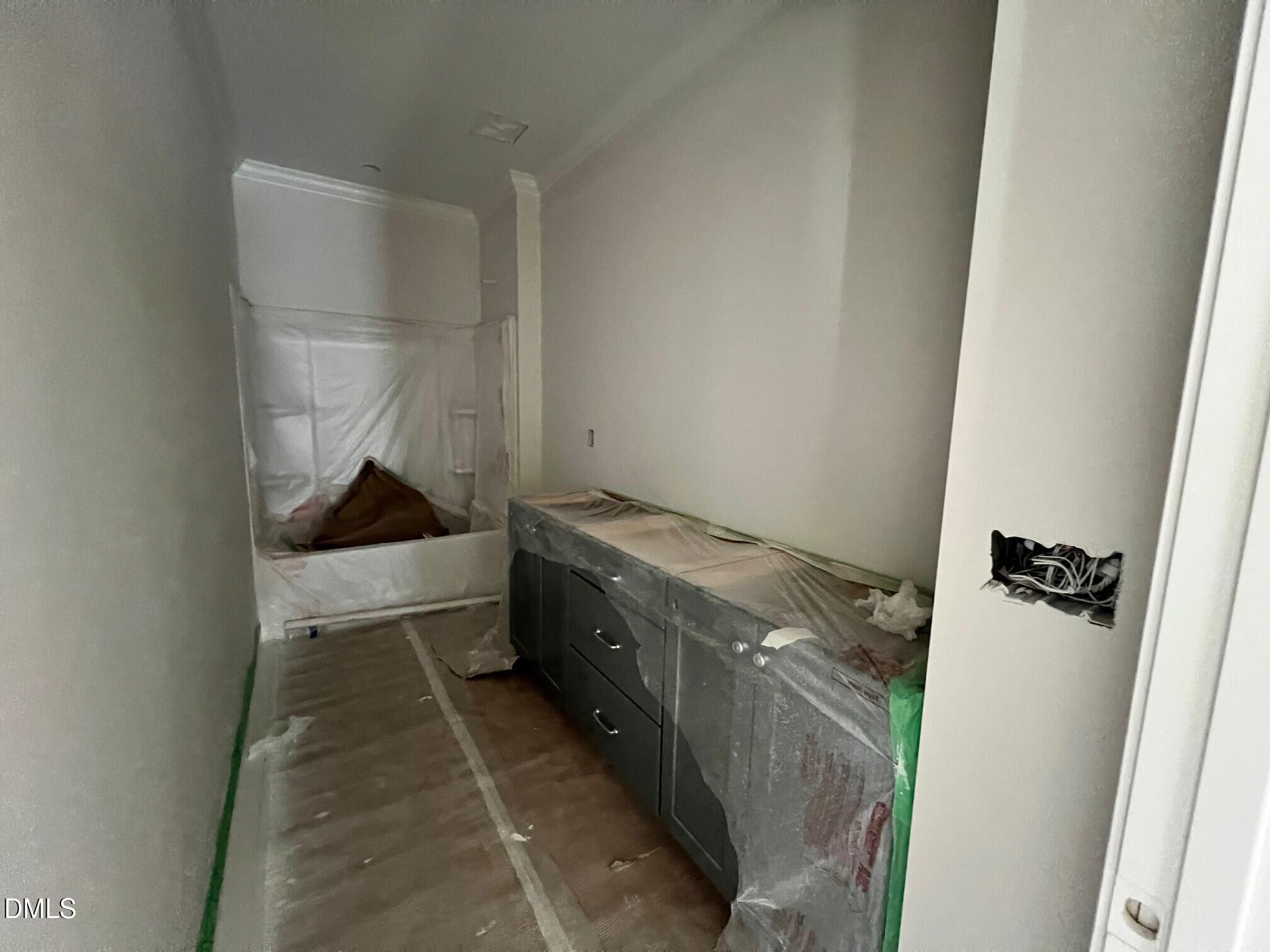 6026 Scalybark Road Durham, NC 27712 - Photo 14 of 55 a room with storage and utility