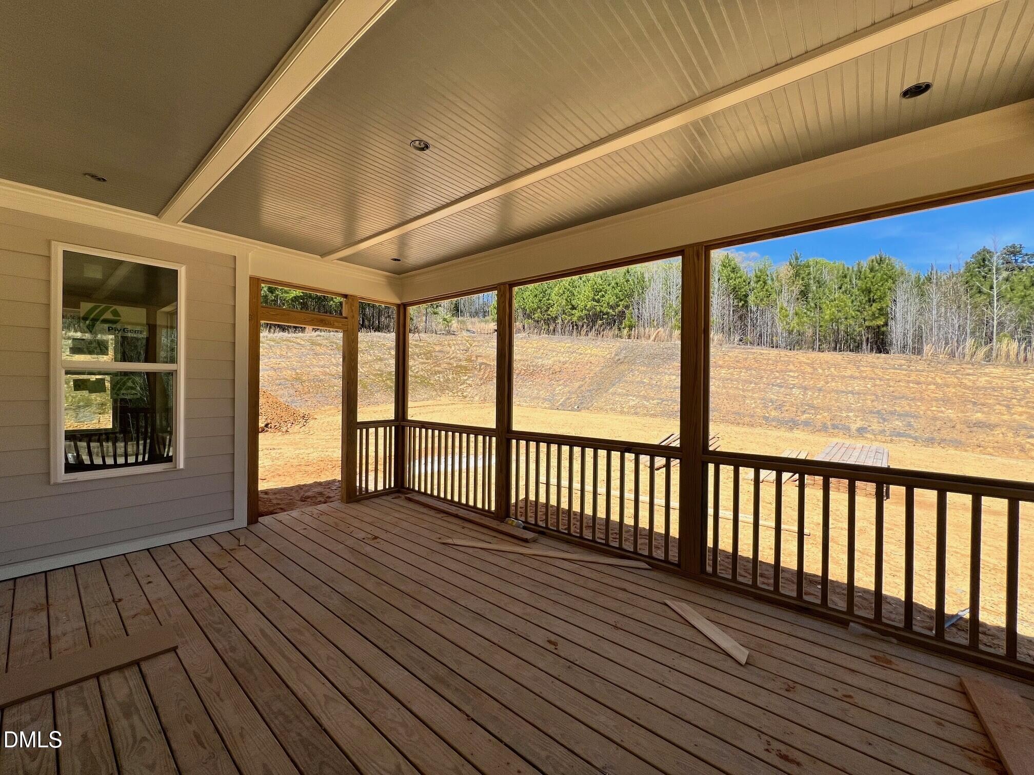 6026 Scalybark Road Durham, NC 27712 - Photo 15 of 55 a view of balcony with wooden floor