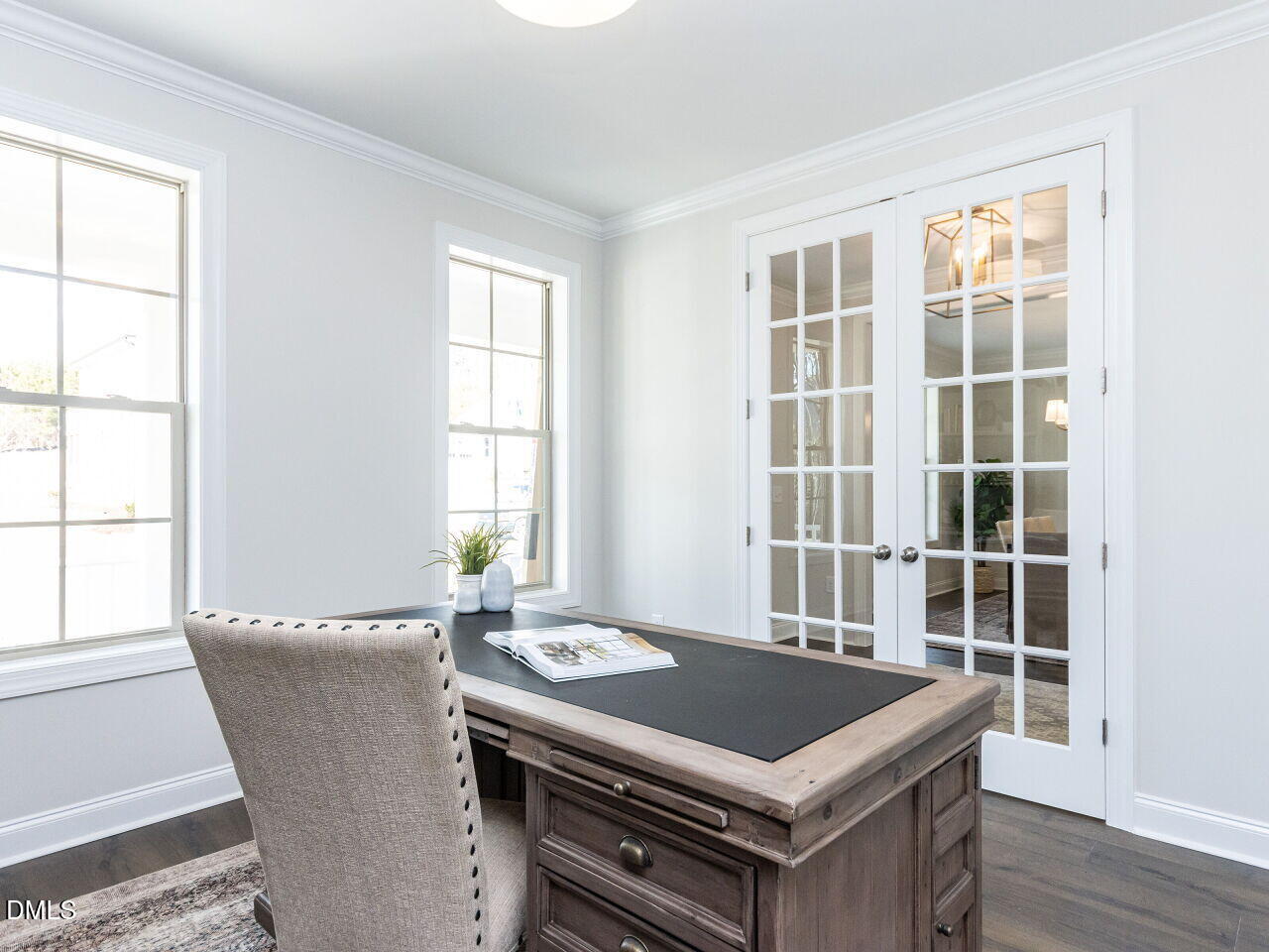 6026 Scalybark Road Durham, NC 27712 - Photo 30 of 55 a view of a kitchen area with furniture and windows