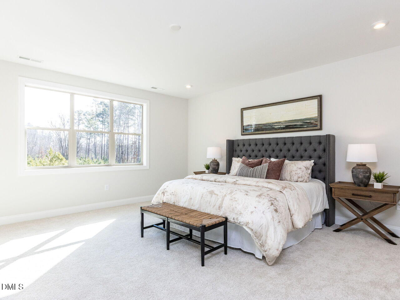 6026 Scalybark Road Durham, NC 27712 - Photo 40 of 55 a bedroom with a bed lamp and a window