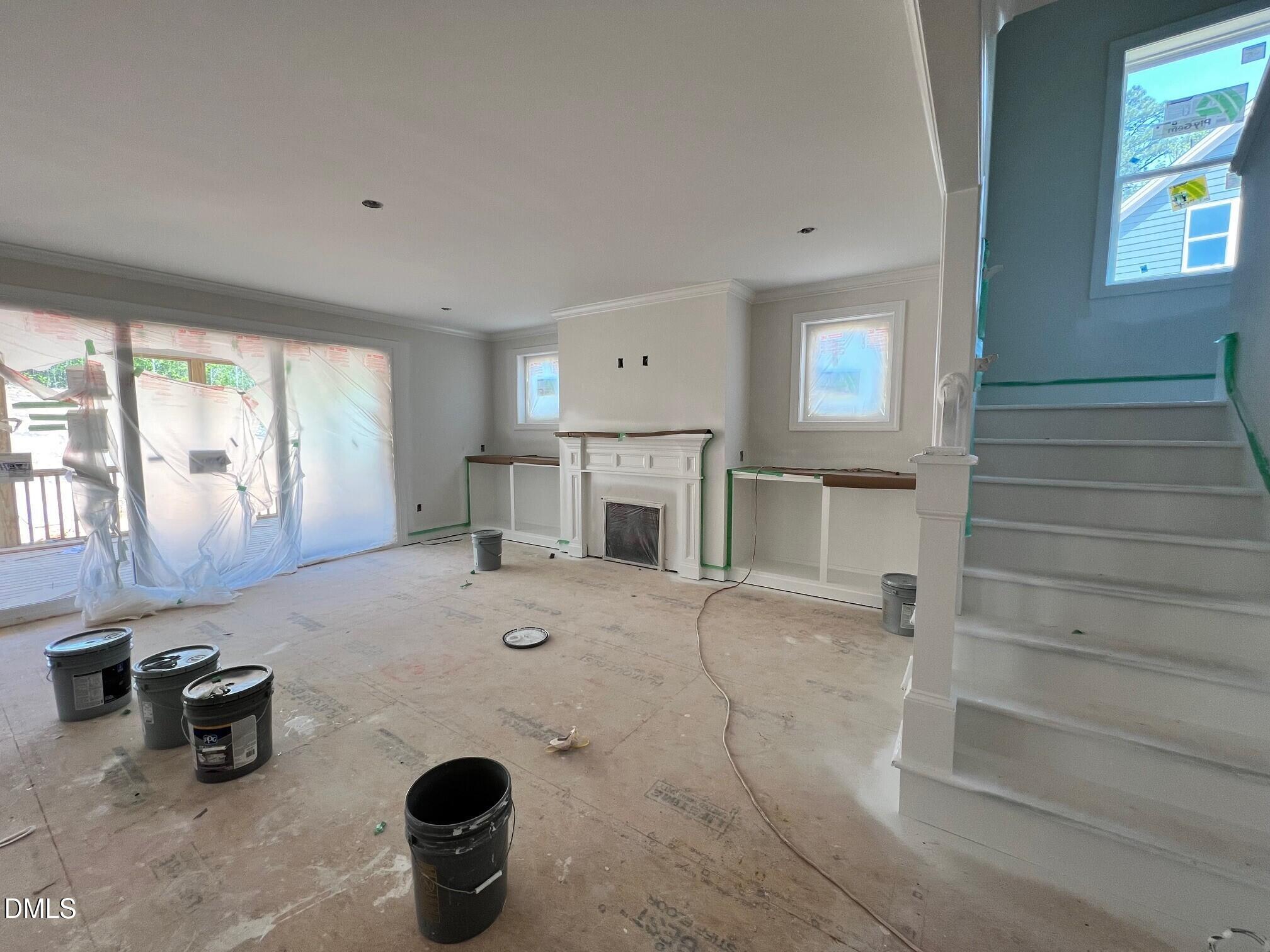 6026 Scalybark Road Durham, NC 27712 - Photo 4 of 55 a living room with furniture and a fireplace
