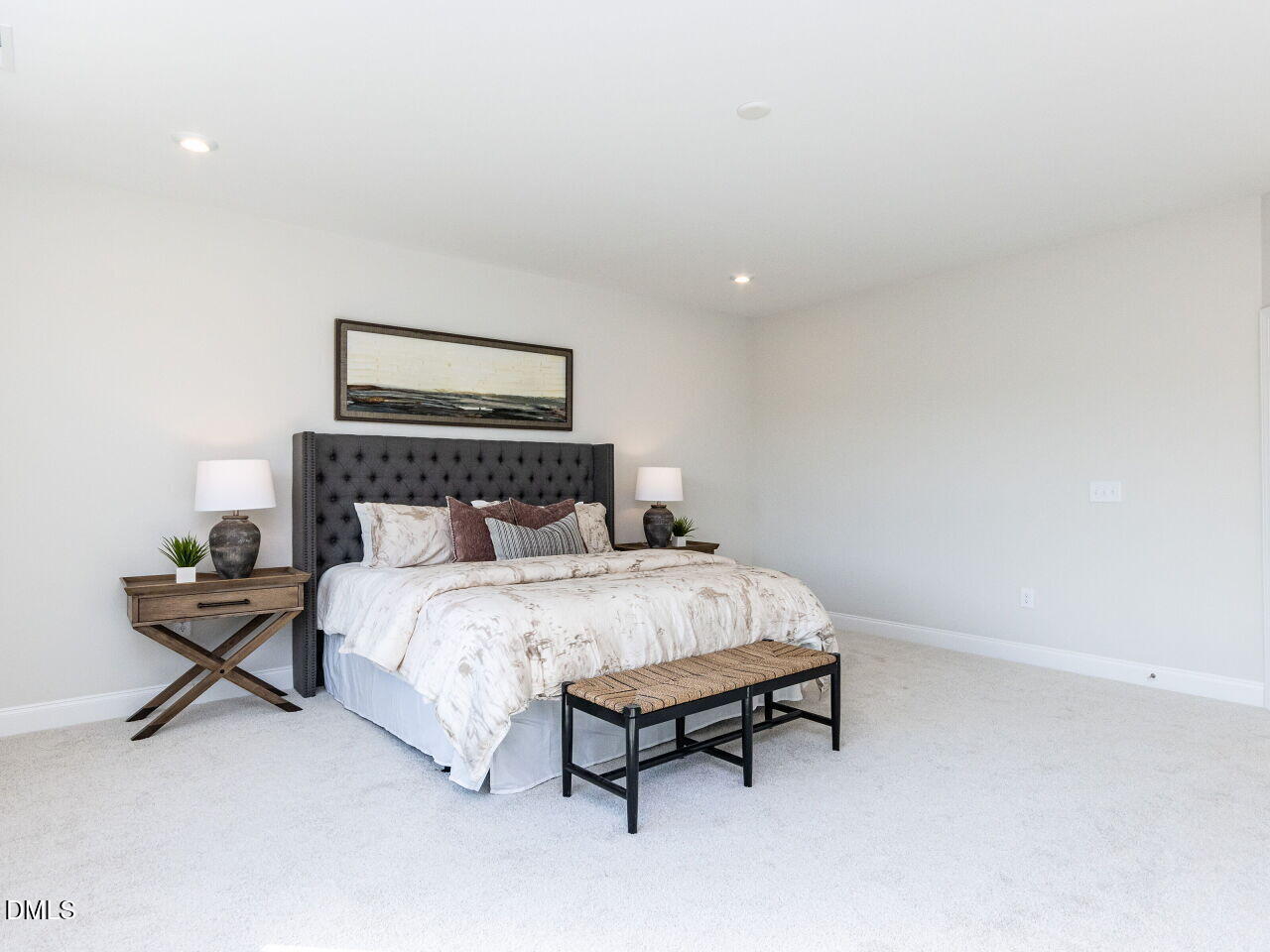 6026 Scalybark Road Durham, NC 27712 - Photo 42 of 55 a bedroom with a bed and a chair