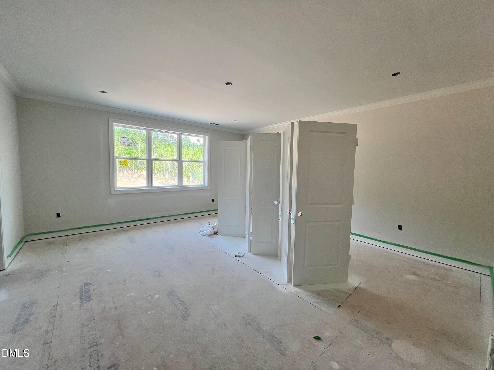 6026 Scalybark Road Durham, NC 27712 - Photo 8 of 55 a view of an empty room with a window