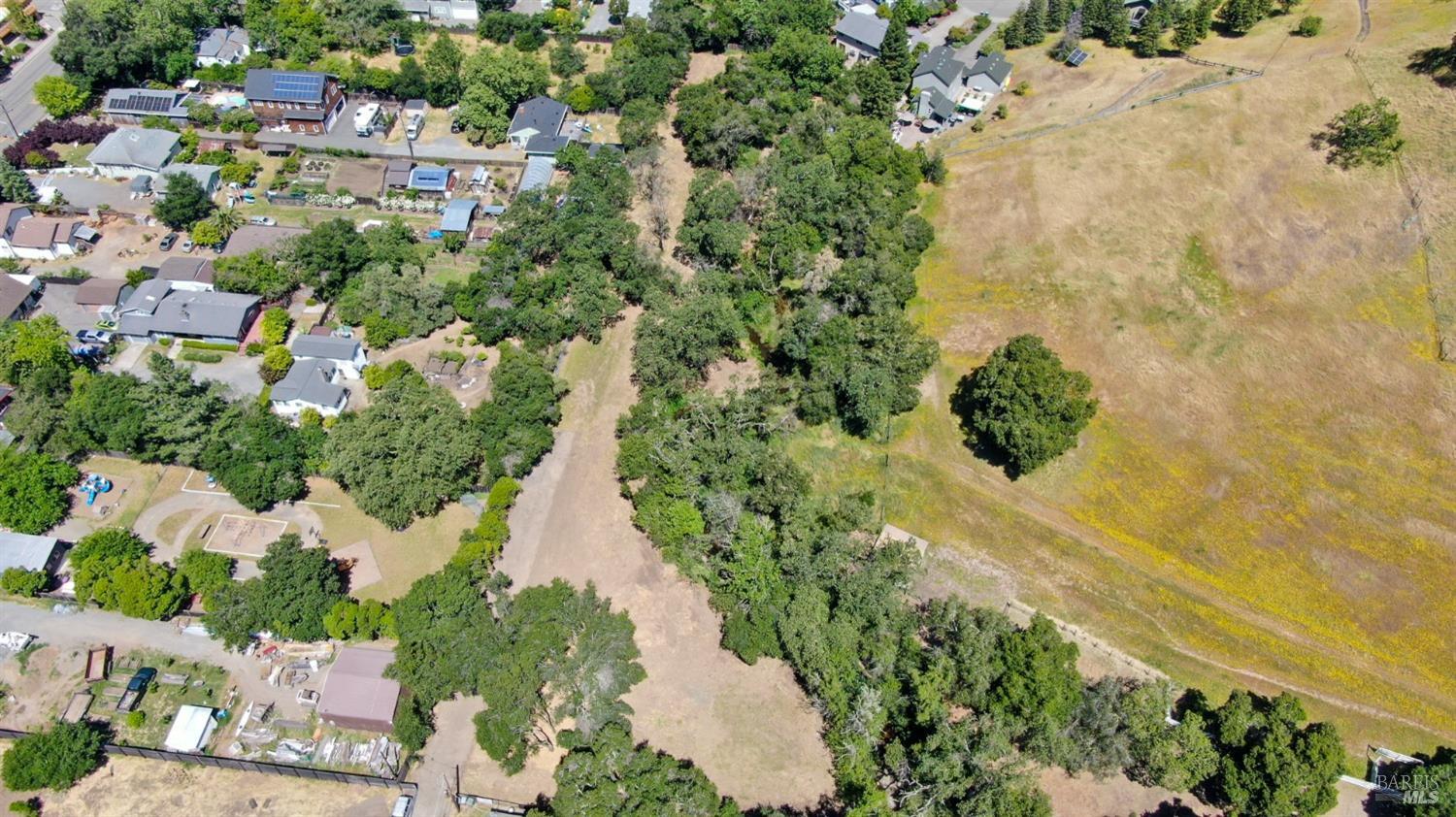 0 University Street, Unit A Cloverdale, CA 95425 - Photo 14 of 15 an aerial view of residential houses with outdoor space