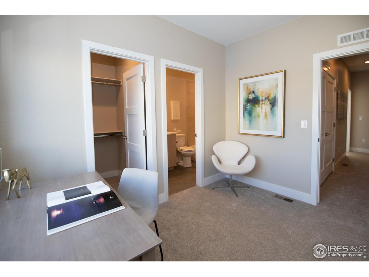 1530 South Terry Street Longmont, CO 80501 - Photo 17 of 21 a living room with furniture a window and a potted plant