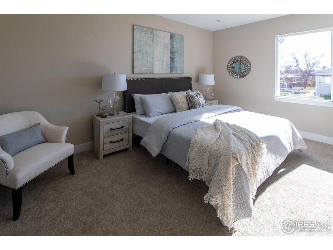 1530 South Terry Street Longmont, CO 80501 - Photo 10 of 21 a bed room with a bed and a window