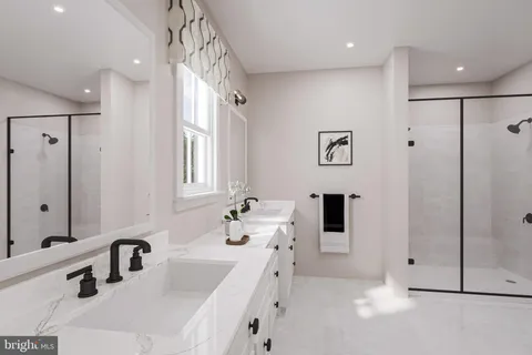 a bathroom with a tub sink and mirror