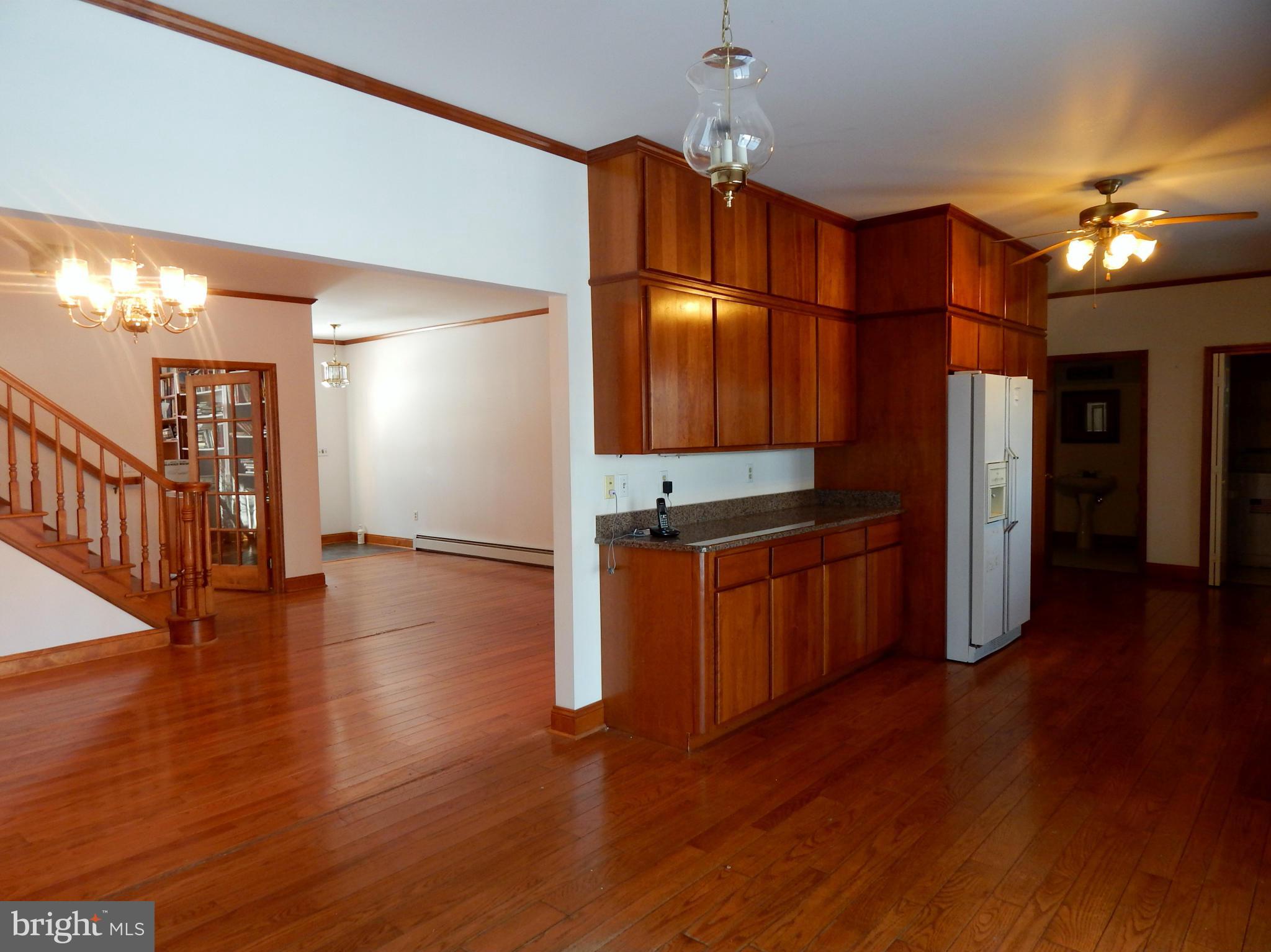 3964 Street Road Street, MD 21154 - Photo 15 of 29 a view of a kitchen with a sink and a refrigerator