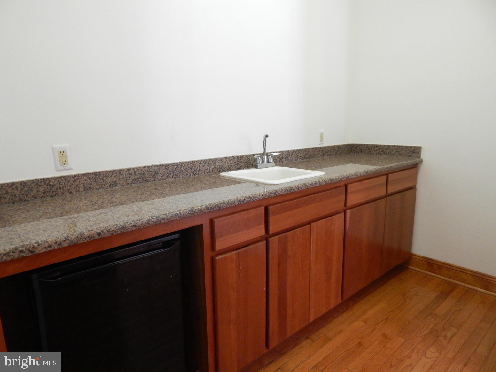 3964 Street Road Street, MD 21154 - Photo 17 of 29 a kitchen with a sink and cabinets