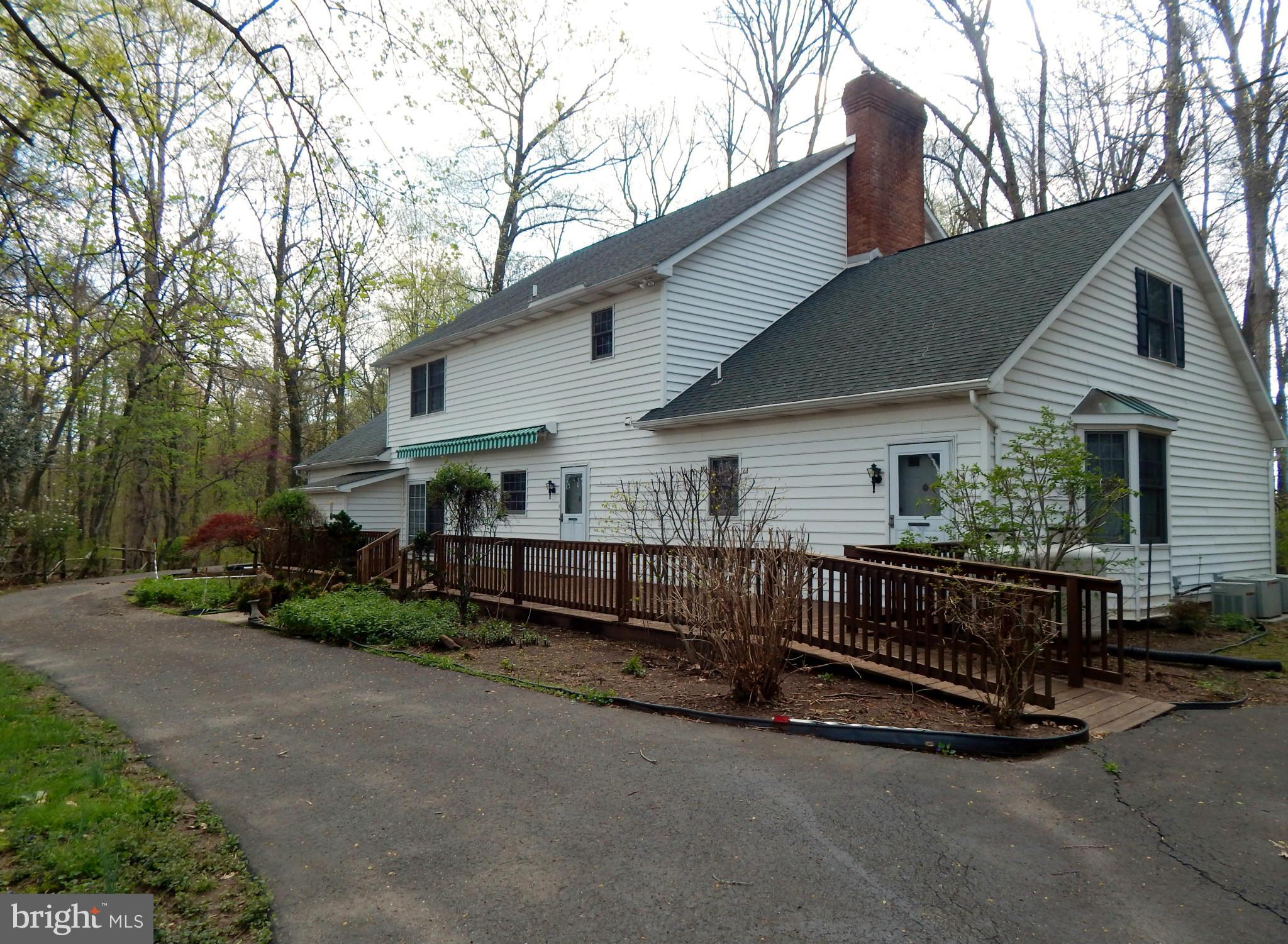 3964 Street Road Street, MD 21154 - Photo 4 of 29 a view of a house with a yard and wooden fence