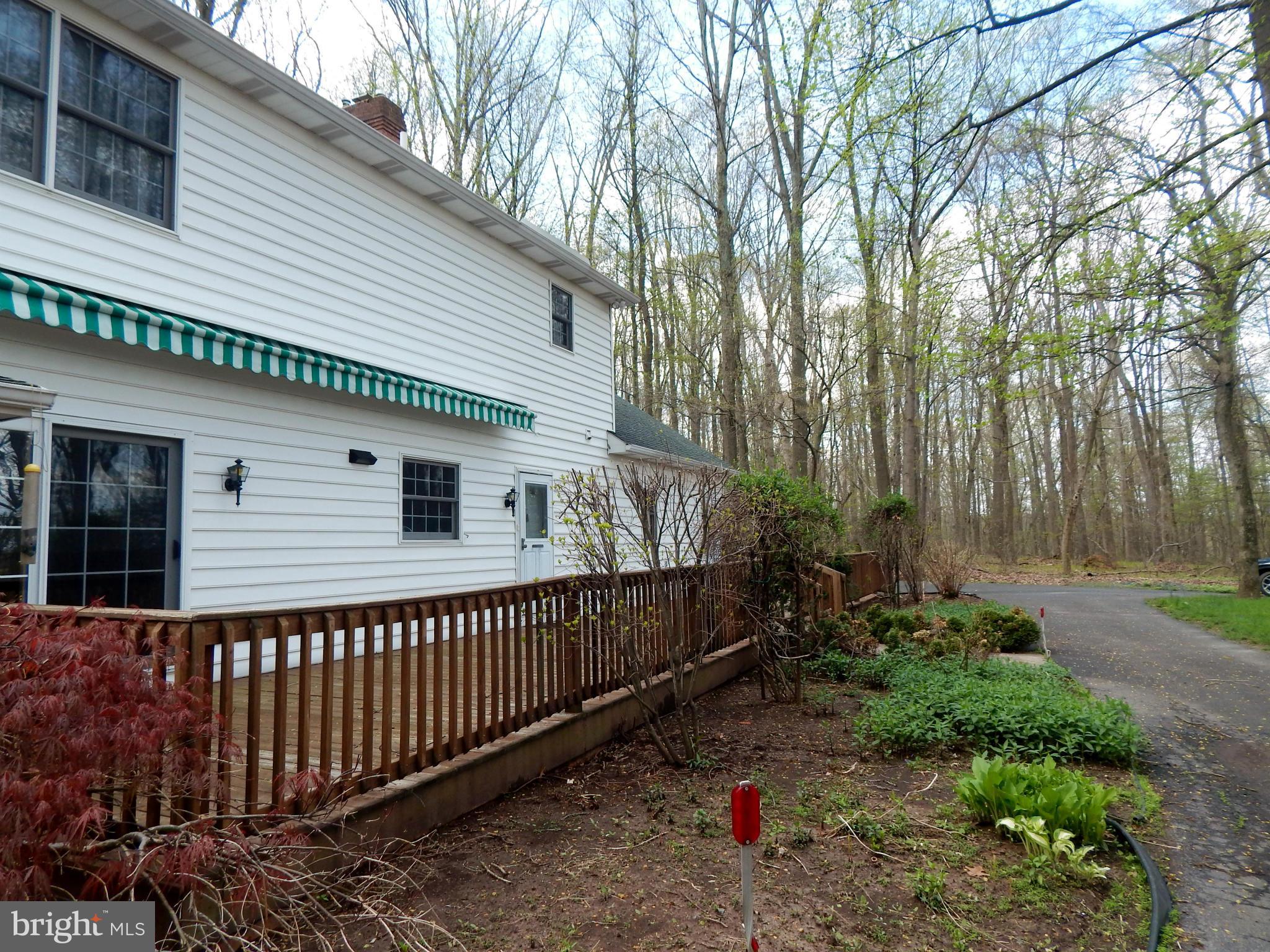 3964 Street Road Street, MD 21154 - Photo 6 of 29 a side view of a house with a small yard
