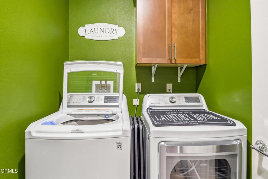 2820 Wagon Wheel Road, Unit 403 Oxnard, CA 93036 - Photo 23 of 35 a kitchen with a stove and a microwave