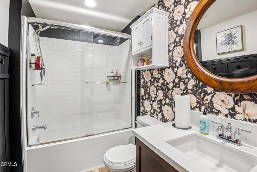 2820 Wagon Wheel Road, Unit 403 Oxnard, CA 93036 - Photo 25 of 35 a bathroom with a sink toilet and shower
