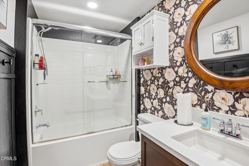 2820 Wagon Wheel Road, Unit 403 Oxnard, CA 93036 - Photo 32 of 35 a bathroom with a sink toilet and shower