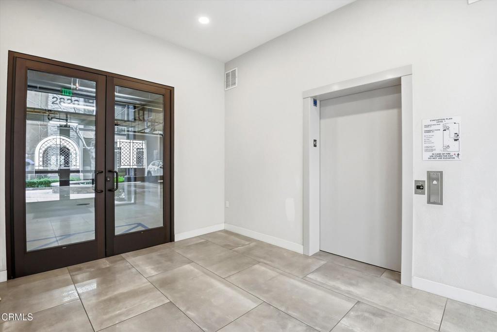 2820 Wagon Wheel Road, Unit 403 Oxnard, CA 93036 - Photo 6 of 35 a view of a big room with sliding door