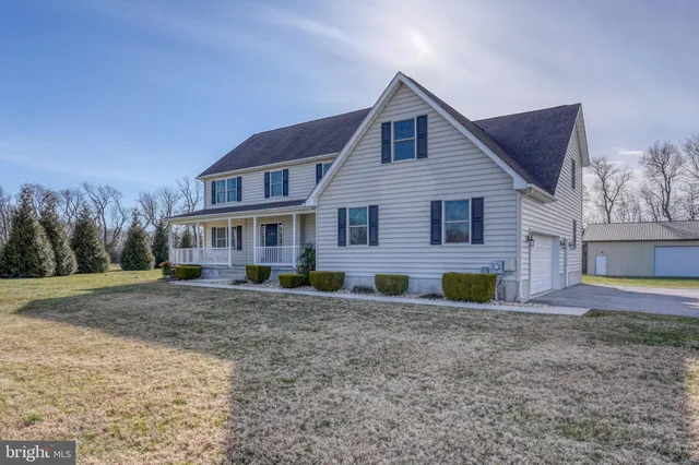 a room with pool table and a chandelier