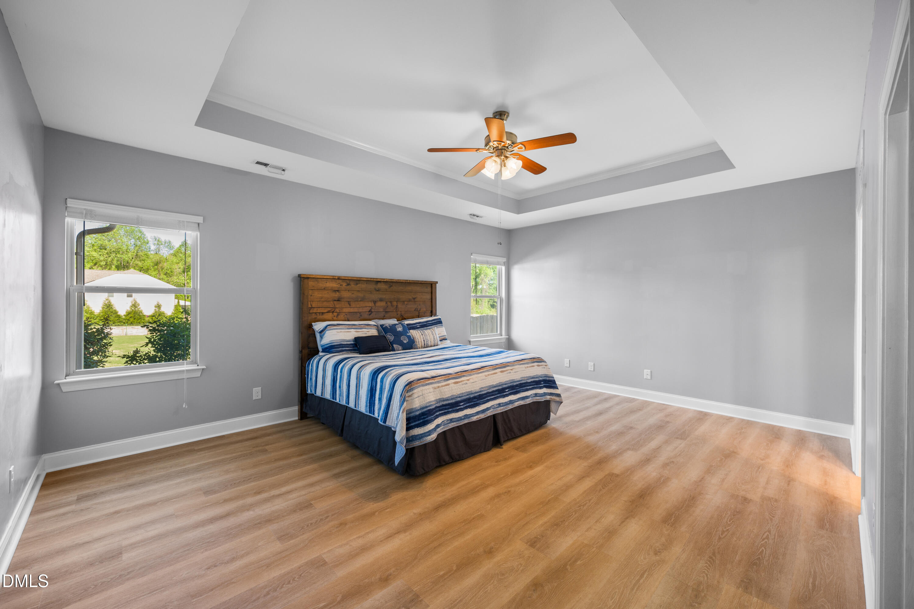 701 Spruce Meadows Lane Willow Spring, NC 27592 - Photo 18 of 54 a bedroom with a bed and a window