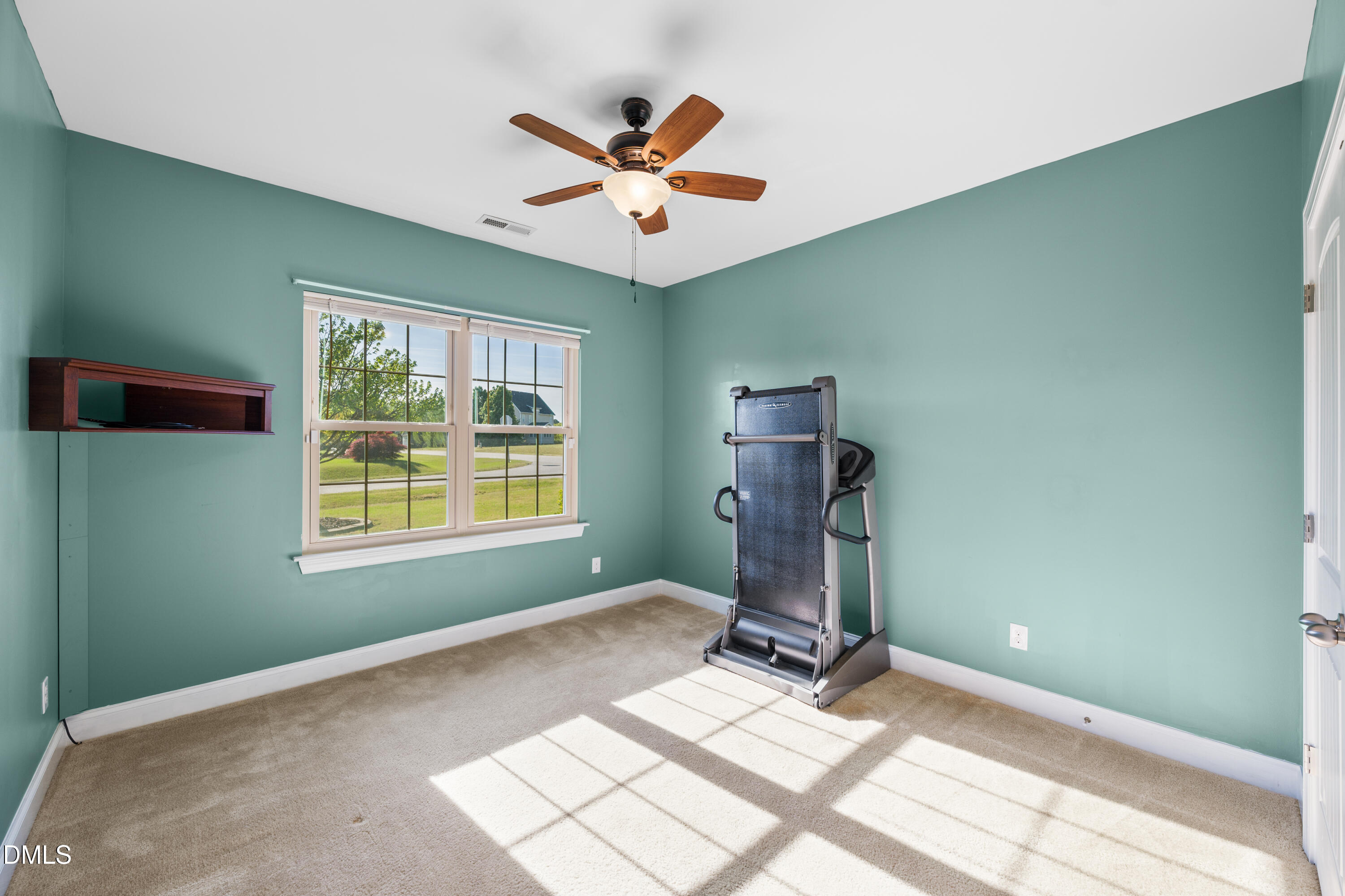 701 Spruce Meadows Lane Willow Spring, NC 27592 - Photo 25 of 54 a very nice looking room with a window