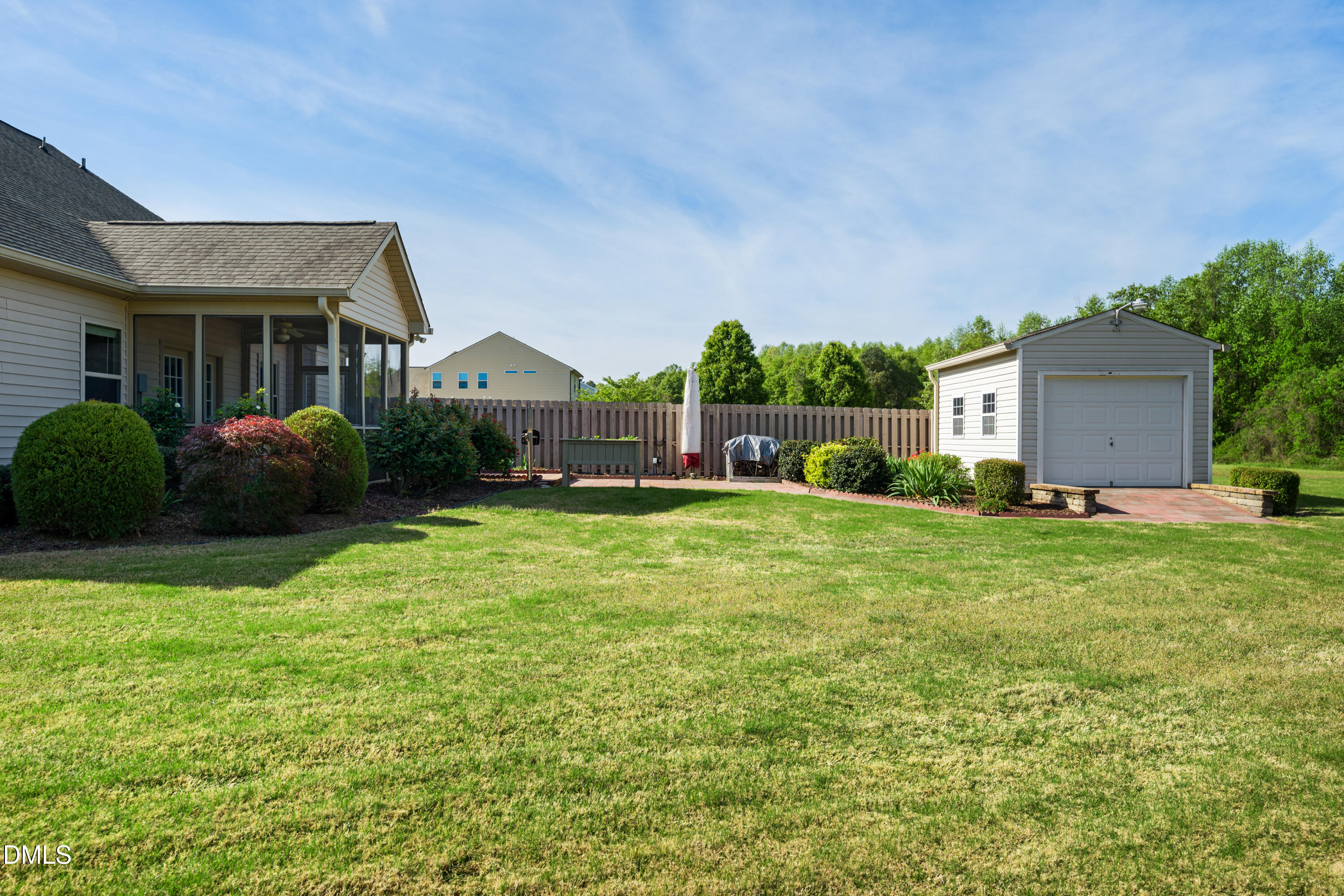 701 Spruce Meadows Lane Willow Spring, NC 27592 - Photo 39 of 54 a front view of house with yard and green space