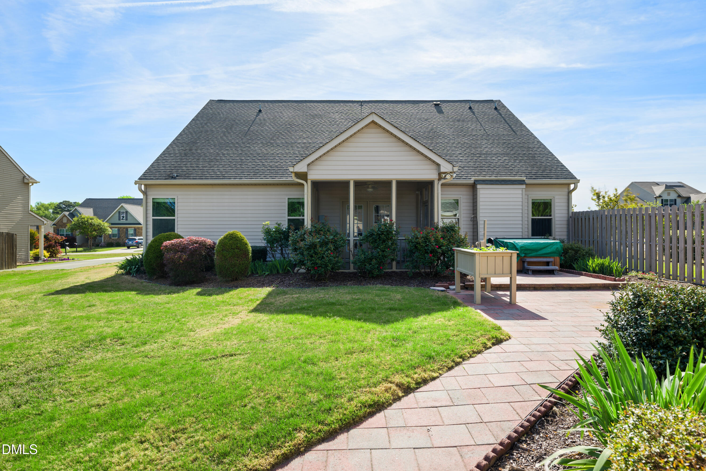 701 Spruce Meadows Lane Willow Spring, NC 27592 - Photo 41 of 54 a view of a house with a yard and plants