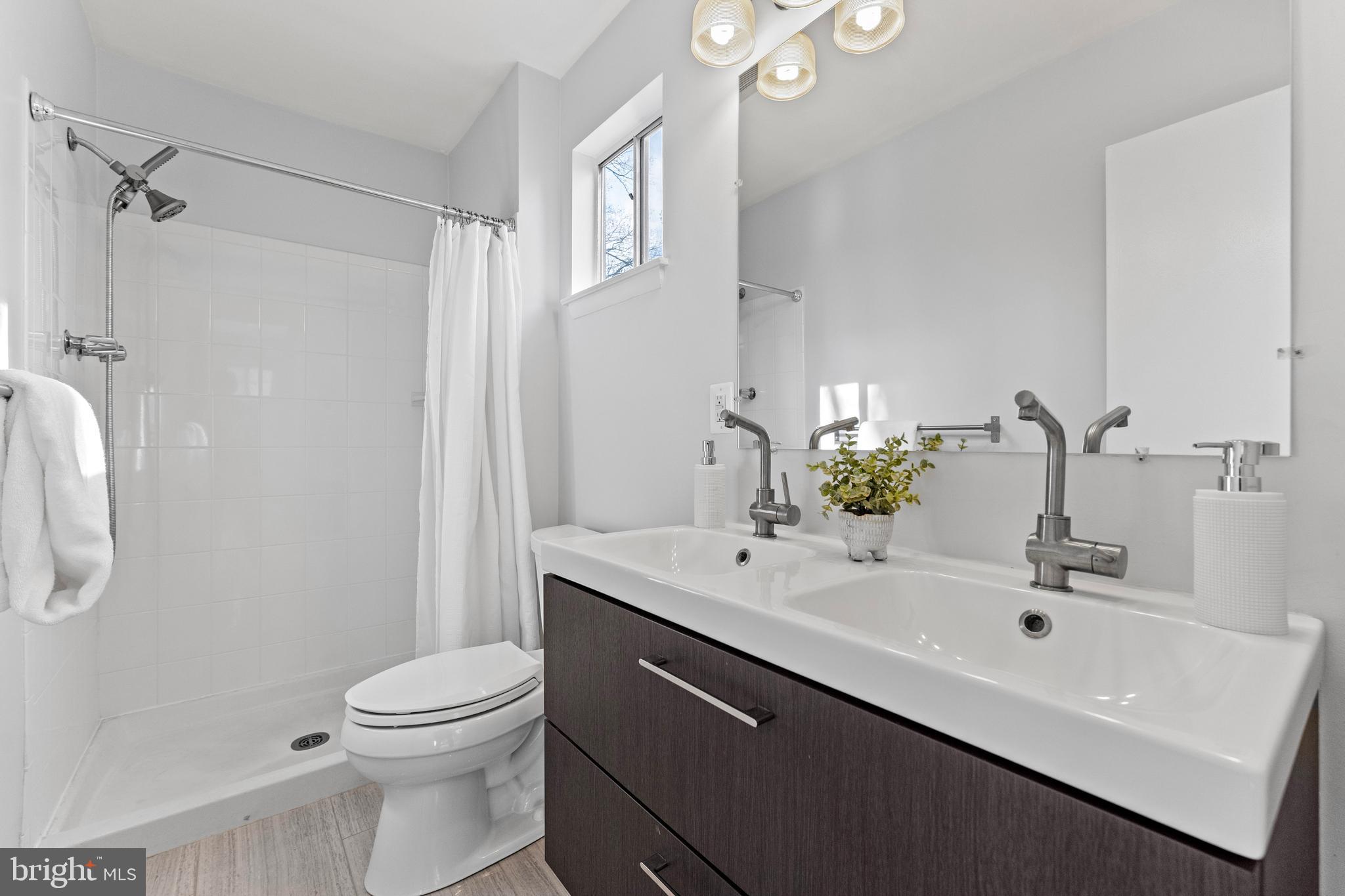 105 Stonegate Drive Silver Spring, MD 20905 - Photo 22 of 35 Primary bathroom has a heated floor.