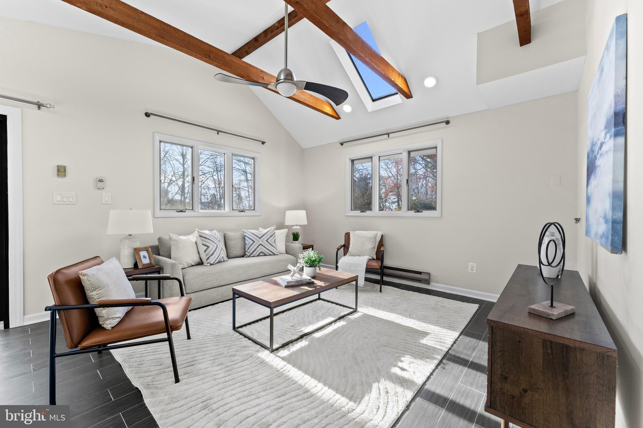 105 Stonegate Drive Silver Spring, MD 20905 - Photo 6 of 35 Features many windows, slider and skylights.