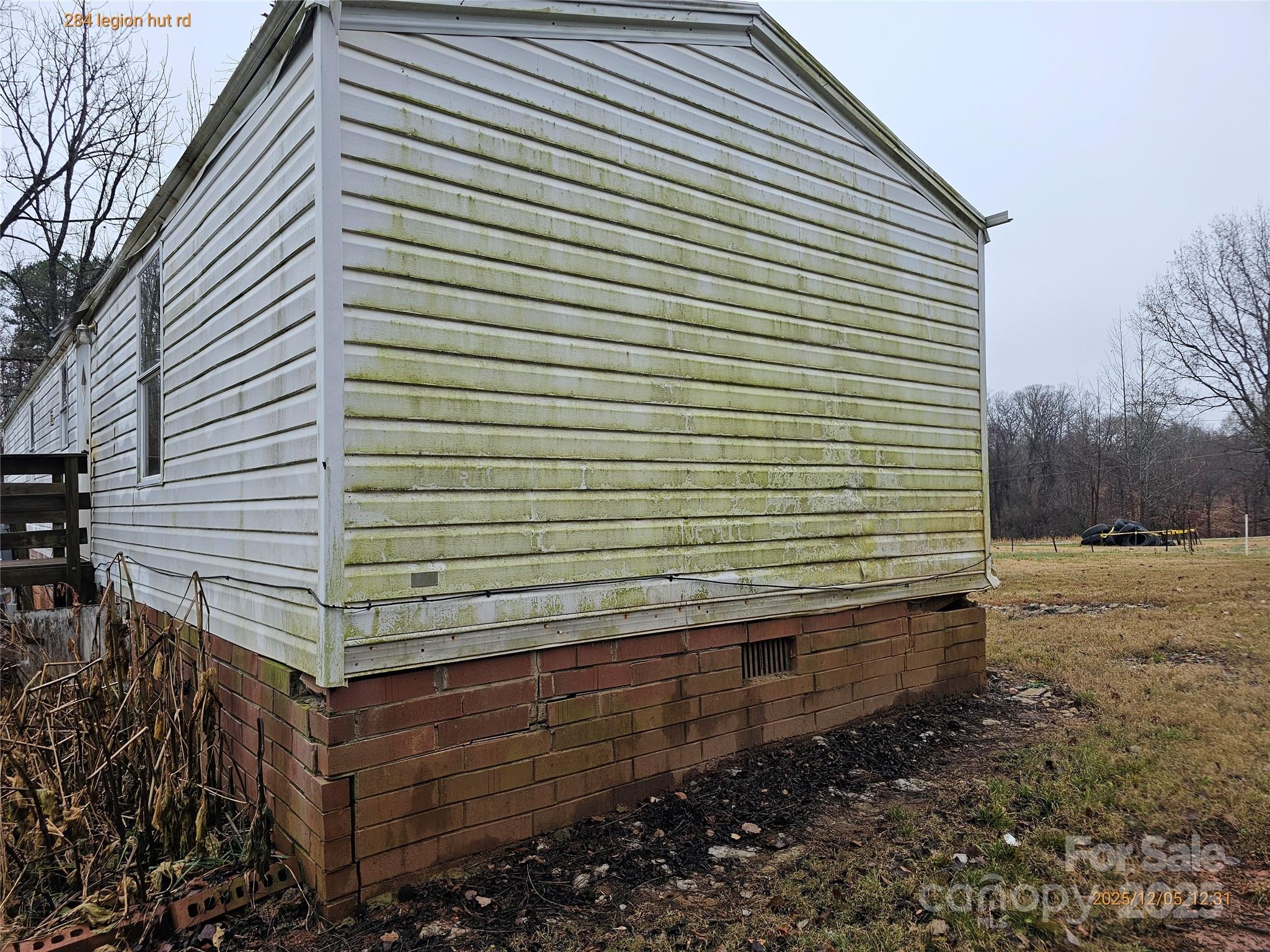 284 Legion Hut Road Mocksville, NC 27028 - Photo 13 of 16 a view of a backyard with pathway