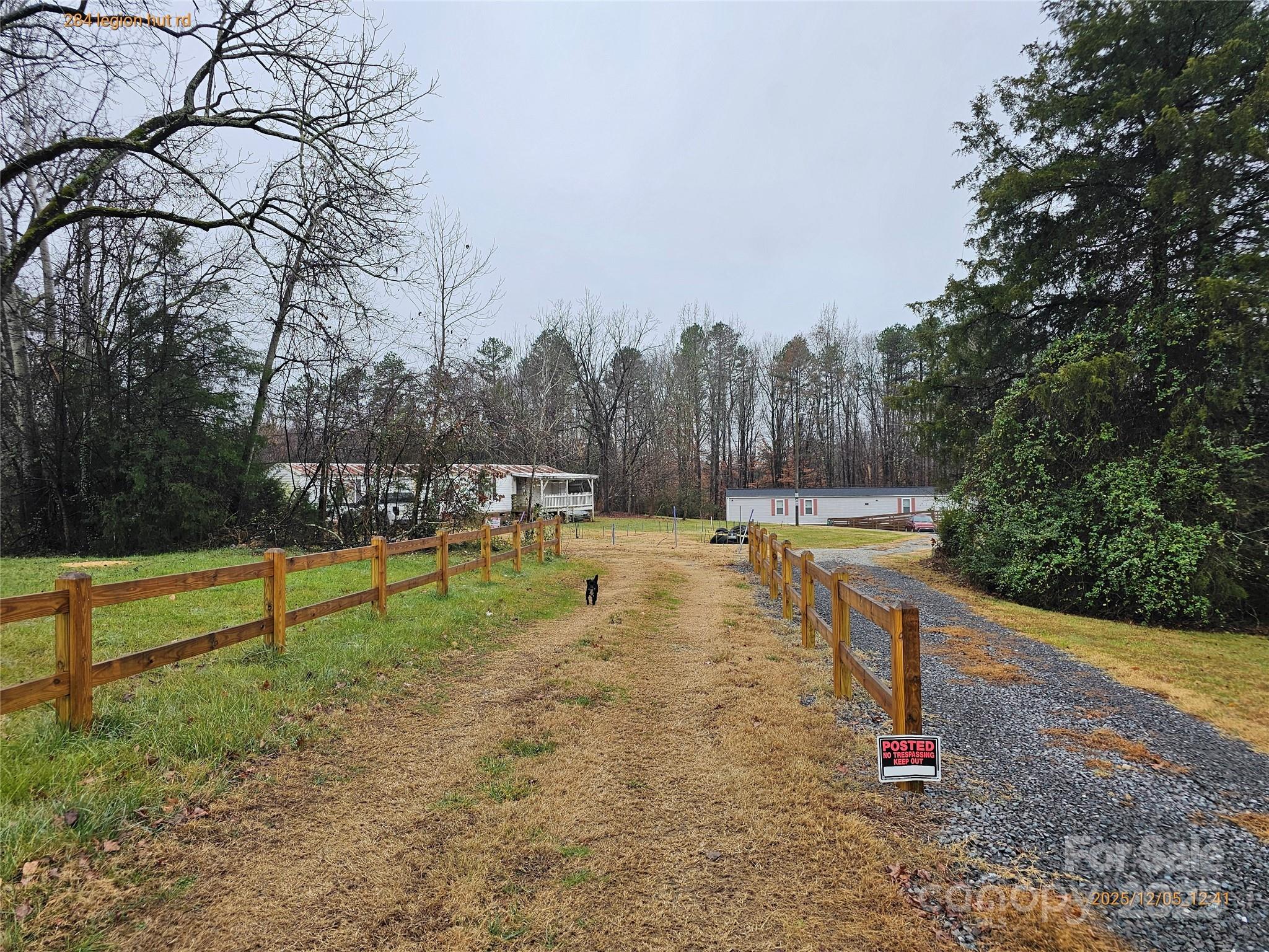 284 Legion Hut Road Mocksville, NC 27028 - Photo 16 of 16 a view of a yard with large trees