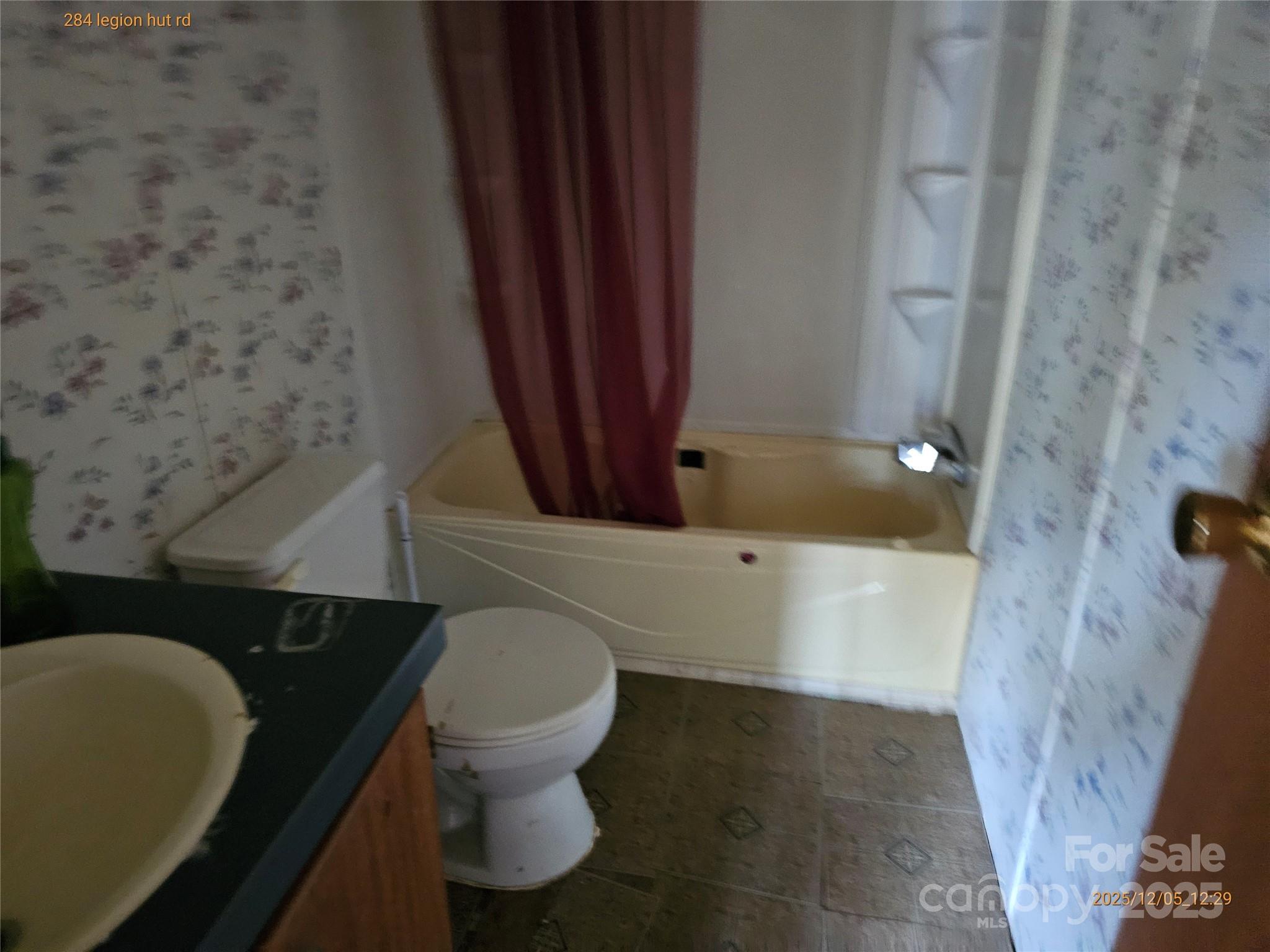 284 Legion Hut Road Mocksville, NC 27028 - Photo 8 of 16 a bathroom with a bathtub and shower