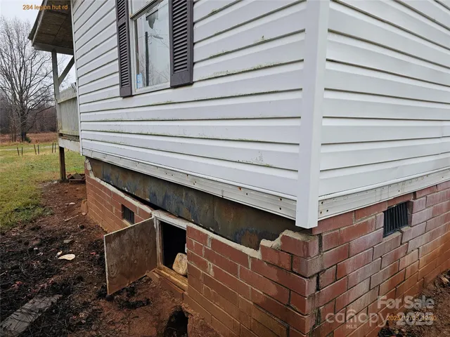 a stove top oven sitting inside of a kitchen