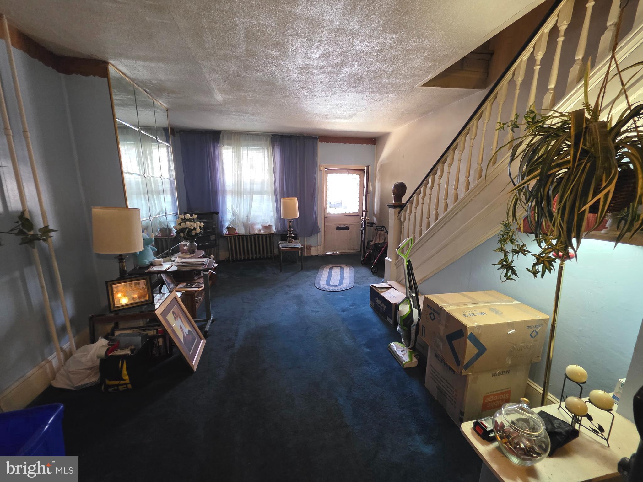 1317 East Rittenhouse Street Philadelphia, PA 19138 - Photo 3 of 16 a living room with furniture and a wooden floor