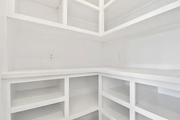 a view of an empty walk in closet