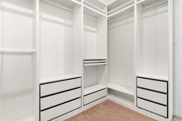 a empty closet with white paint