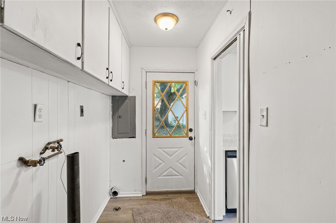 898 Reed Avenue Akron, OH 44306 - Photo 16 of 26 Laundry room featuring light hardwood floors