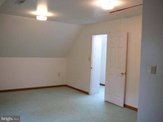 12507 Marlow Road Fulton, MD 20759 - Photo 11 of 13 One of two bonus room/playrooms
