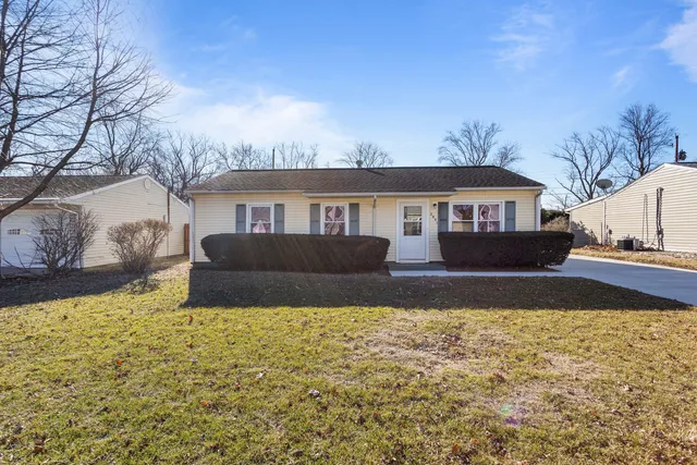 a house view with a garden space