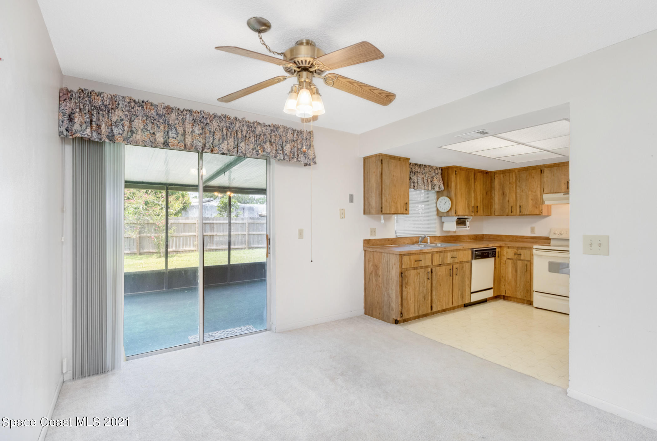 1627 West Shores Road Melbourne, FL 32935 - Photo 7 of 26 Dining room and kitchen