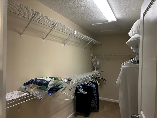 a bathroom with a sink double vanity and a mirror