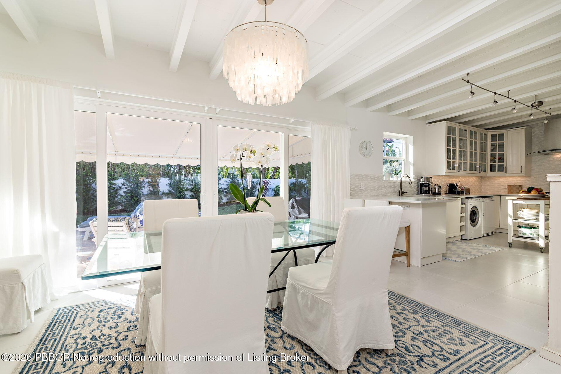 224 Churchill Road West Palm Beach, FL 33405 - Photo 8 of 33 a living room with furniture and a chandelier